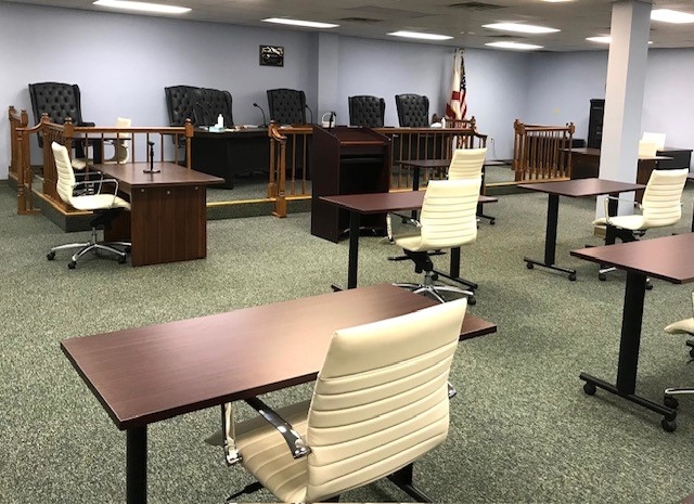 Meeting room with tables and chairs.